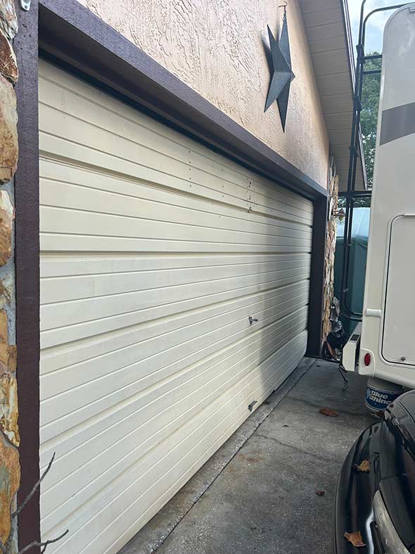 Before New Garage Door Installed on Tampa Home